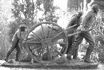 Statue depicting a typical handcart family
